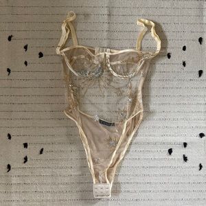 Sparkly bodysuit.  Lingerie.